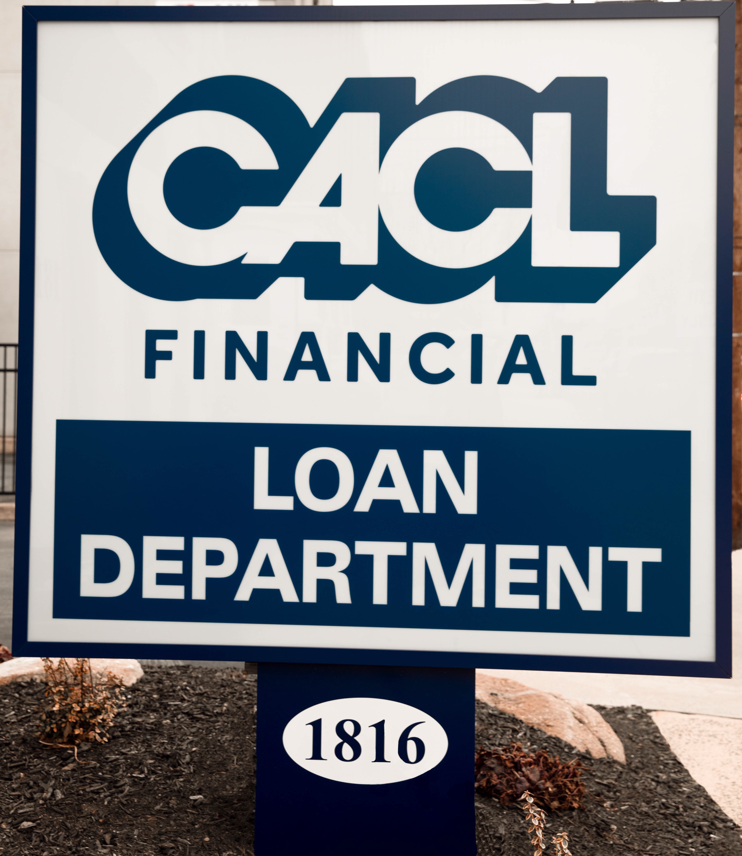 CACL Loan Department sign